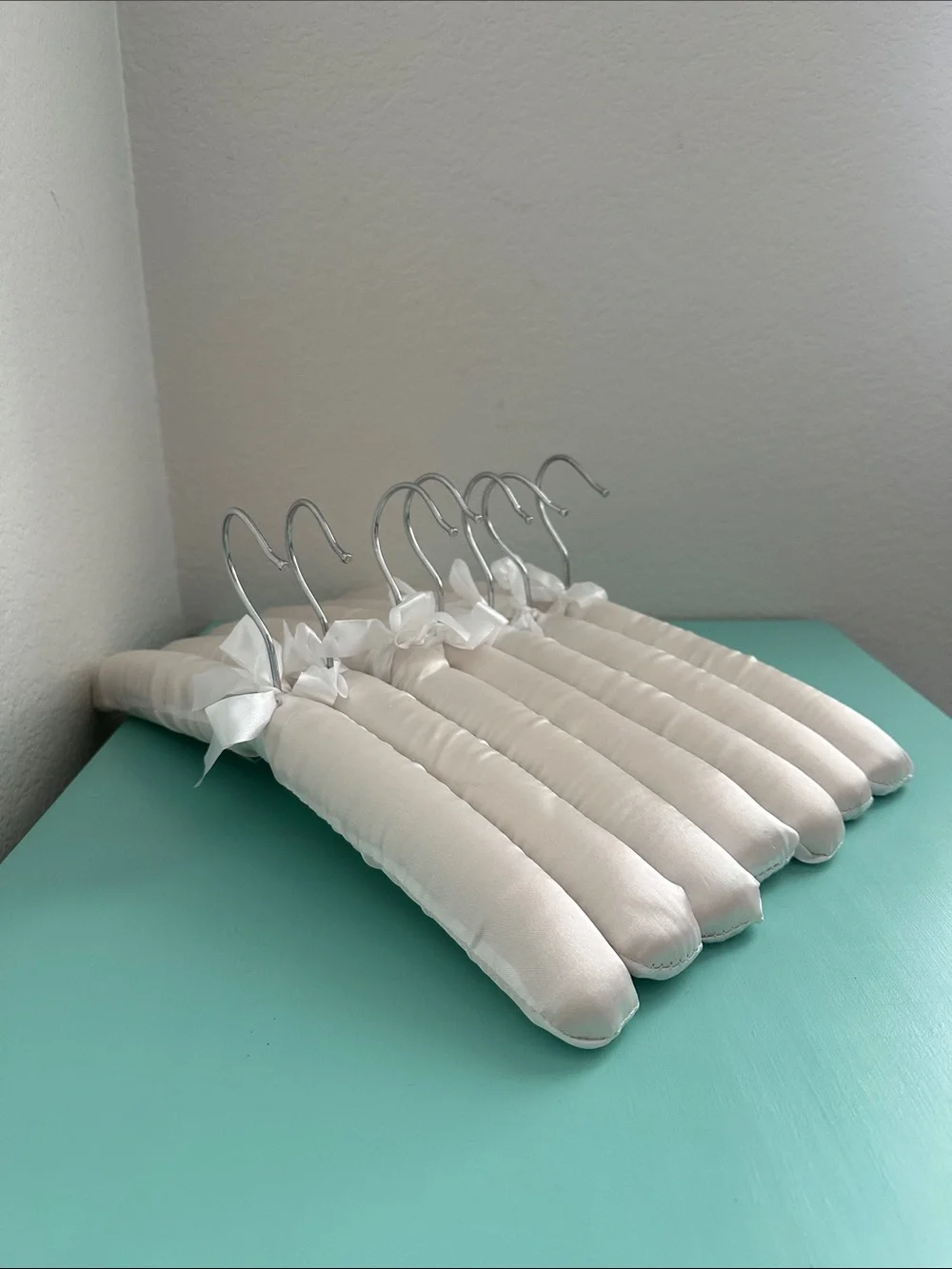 Satin white glossy padded heavy duty hangers-set of 7ct. with a bow-brand new